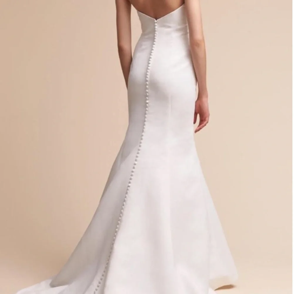 BHLDN Strapless White Mermaid Wedding Gown with Covered Buttons